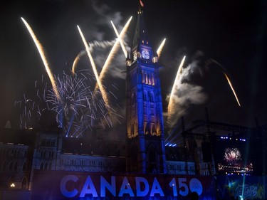Fireworks explode over the Peace Tower during the evening ceremonies of Canada's 150th anniversary of Confederation, in Ottawa on Saturday, July 1, 2017.