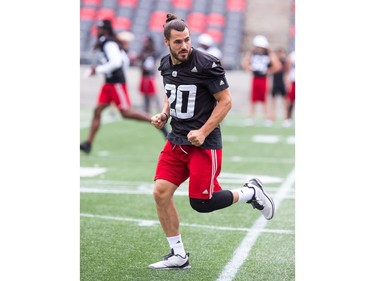 Linebacker JP Bolduc covers a runner as the Ottawa Redblacks practice at TD Place.