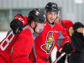 Filip Chlapik, left, receives a hug from Colin White during the one of the workouts during the Senators' 2017 development camp at the Bell Sensplex.  Wayne Cuddington/Postmedia