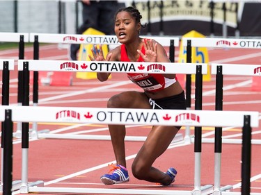 Heptathlete Anya Akili lands awkwardly on her leg and wouldn't finish the 100m hurdles as the Canadian Track and Field Championships get underway at the Terry Fox Athletic Facility.  Wayne Cuddington/ Postmedia
Wayne Cuddington, Postmedia