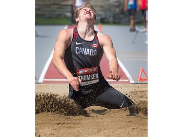 Decathlete Ryan Thomsen lands in the sand during the long jump as the Canadian Track and Field Championships get underway at the Terry Fox Athletic Facility.