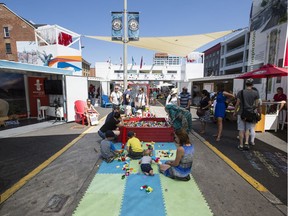 People play with building blocks at Inspiration Village in the BywardMarket in Ottawa Monday, August 1, 2017.