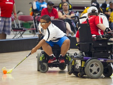 Malaky Lamberson, No. 8, was one of the top goal scorers for the Ottawa Black Aces as the Canadian Electric Wheelchair Hockey Association (CEWHA) held its 2017 Nationals at Carleton University's Raven's Nest Saturday August 5, 2017.Ashley Fraser/Postmedia
Ashley Fraser, Postmedia