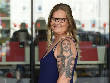 Ulla Karin Karlsson, mother of Erik Karlsson, shows off the tattoo of her children at the National Gallery of Canada on Saturday, Aug. 5, 2017.