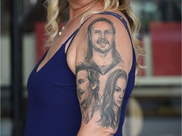 Ulla Karin Karlsson, mother of Erik Karlsson, shows off the tattoo of her children at the National Gallery of Canada on Saturday, Aug. 5, 2017.