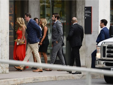 Guests of the Karlsson wedding, including former Ottawa Senator Mika Zibanejad, centre, arrive at the National Gallery of Canada on Saturday, Aug. 5, 2017.