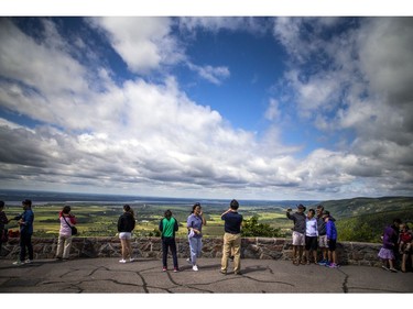 The mix of sun and clouds and cooler temperatures made for a perfect day to get out to Champlain Lookout on Sunday.   Ashley Fraser/Postmedia