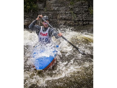 Yannick Laviolette of St-Louis-de-Gonzaque, Que., competes in the C1 under-23 men's division during the Canoe Slalom Nationals at The Pumphouse Course on Sunday.   Ashley Fraser/Postmedia