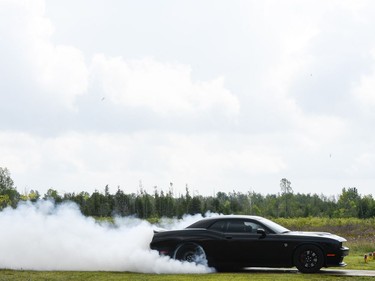 One of the participants of the speed runs smoke his tires before the race to gain more grip at Race the Runway event held at Russ Beach Montague air port on Saturday, Aug. 12, 2017. Event raises fund for the community, charities, and Aviation Museum. (James Park)

Slug:  Assignment no.: 127275
James Park