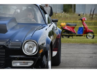 One of the drivers participating in the speed runs waits for his turn at Race the Runway.