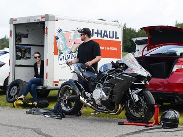 Adam Burrows changes the tires on his stretched 2016 Kawasaki Ninja H2.