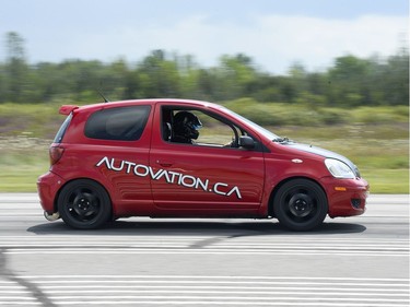 Derek Lamoureux in his twin-engine modified 2005 Toyota Echo begins the run at Race the Runway.