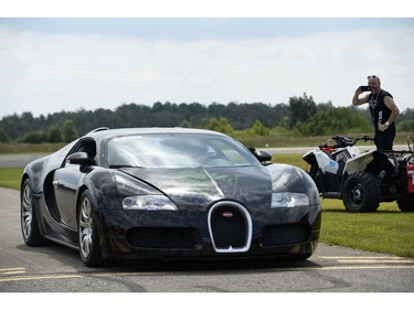 A Bugatti Veyron was one of many exotic cars at Race the Runway.