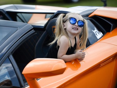 Sophia Seccaspina, 3, sits in the driver's seat of her father's Lamborghini Aventador.