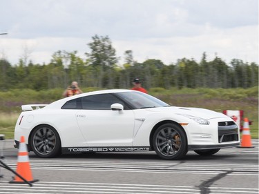 A Nissan GTR begins the speed run.