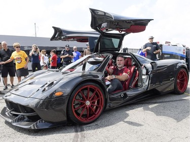 Olivier Benloulou sits in his $3.5-million Pagani Huayra during Race the Runway at the Russ Beach Montague Airport on Saturday.