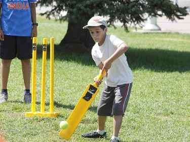 Raian, 9, tries his hand at cricket at the South Asian Festival at City Hall in Ottawa on Sunday, August 13, 2017.