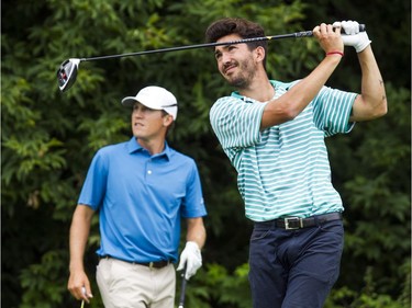 Kramer Hickok watches Raoul Menard's ball during the National Capital Open to Support Our Troops Saturday August 19, 2017 at the Hylands Golf Club.