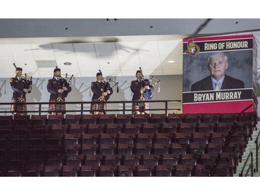 Ottawa Fire Services bagpipers play during a celebration of life service for former Ottawa Senators general manager and coach, Bryan Murray, at the Canadian Tire Centre Thursday, August 24, 2017.