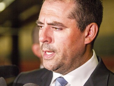 Former Ottawa Senator, Chris Phillips, speaks with the media before a celebration of life service for former Ottawa Senators general manager and coach, Bryan Murray, at the Canadian Tire Centre Thursday, August 24, 2017.(