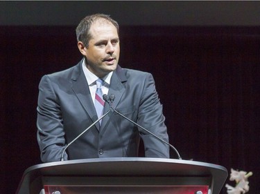 Former Ottawa Senator Chris Philips speaks during a celebration of life service for former Ottawa Senators general manager and coach, Bryan Murray, at the Canadian Tire Centre Thursday, August 24, 2017