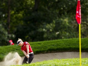 Brooke Henderson hits out of a sand trap on the 13th hole during the second round of the CP Women's Open at the Ottawa Hunt and Golf Club in Ottawa Friday, August 25, 2017.