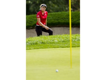 Brooke Henderson looks at her ball after hitting out of a sand trap during the second round of the CP Women's Open at the Ottawa Hunt and Golf Club in Ottawa Friday, August 25, 2017.