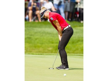 Brooke Henderson reacts to narrowly missing a putt on the 13th hole during the second round of the CP Women's Open at the Ottawa Hunt and Golf Club in Ottawa Friday, August 25, 2017.