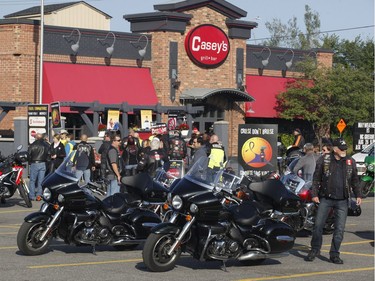 Bikers take part in the "Bikers Against Violence - Cruise Don't Bruise" 8th annual motorcycle ride in Ottawa on Saturday, August 26, 2017