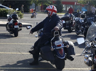 Bikers take part in the "Bikers Against Violence - Cruise Don't Bruise" 8th annual motorcycle ride in Ottawa on Saturday, August 26, 2017.