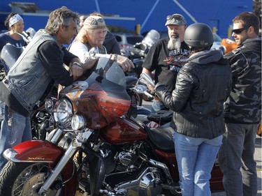 Bikers take part in the "Bikers Against Violence - Cruise Don't Bruise" 8th annual motorcycle ride in Ottawa on Saturday, August 26, 2017.