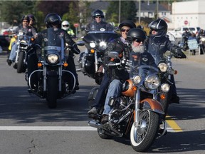 Bikers take part in the "Bikers Against Violence - Cruise Don't Bruise" 8th annual motorcycle ride in Ottawa on Saturday, August 26, 2017.