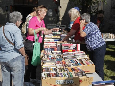 Members of the public visit the Westboro Fuse street festival in Ottawa on Saturday, August 26, 2017.