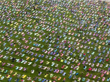 Hundreds of people take part in the last yoga on Parliament Hill event hosted by Lululemon Athletica Wednesday, August 30, 2017.