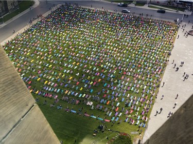 Hundreds of people take part in the last yoga on Parliament Hill event hosted by Lululemon Athletica Wednesday, August 30, 2017.