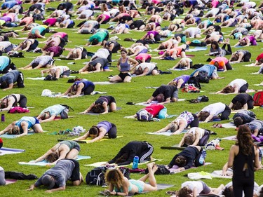 Hundreds of people take part in the last yoga on Parliament Hill event hosted by Lululemon Athletica Wednesday, August 30, 2017.