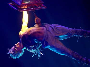 An aerialist dangles from a suspended during the dress rehearsal for Cirque du Soleil VOLTA in Gatineau Wednesday (August 2, 2017) evening.