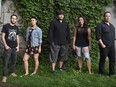 Organizers Howard Adler, far left, and Christopher Wong, far right, stand with Silla & Rise's Cynthia Pitsiulak, Rise Ashen, and Charlotte Qamaniq, in Ottawa on Wednesday, August 2, 2017. The Juno-nominated group will perform at the Asinabka Festival, an Indigenous film and arts event, taking place next week.