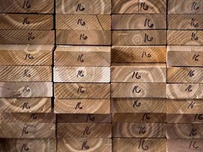 Cedar planks are stacked at a lumber yard, Tuesday, April 25, 2017 in Montreal. Foreign Affairs Minister Chrystia Freeland says the outlines of a deal with the United States to resolve the softwood lumber dispute are in place.THE CANADIAN PRESS/Paul Chiasson