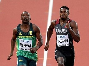 Canada&#039;s Aaron Brown and South Africa&#039;s Clarence Munyai, left, race during their heat of the Men&#039;s 200 meters at the World Athletics Championships in London Monday, Aug. 7, 2017. (AP Photo/Martin Meissner)
