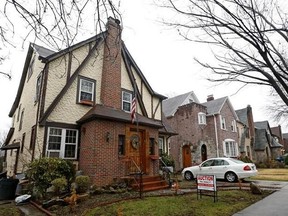 FILE - This Jan. 17, 2017 file photo shows the boyhood home of President Donald Trump in New York. The 1940 Tudor-style house in Queens is on Airbnb and is being offered for $725 a night. (AP Photo/Kathy Willens)