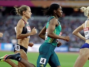 South Africa&#039;s Caster Semenya, center, races with Canada&#039;s Melissa Bishop, left, and Britain&#039;s Lynsey Sharp on her way to winning the gold in the final of the Women&#039;s 800m during the World Athletics Championships in London Sunday, Aug. 13, 2017. (AP Photo/David J. Phillip)
