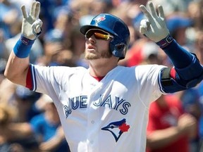 Toronto Blue Jays Josh Donaldson crosses home plate after hitting a two-run home run against the Pittsburgh Pirates in the first inning of their interleague MLB baseball game in Toronto on Sunday, August 13, 2017.