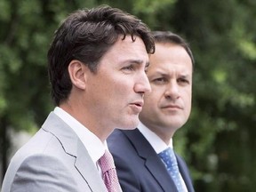 Prime Minister Justin Trudeau, left, speaks to the media as Irish Taoiseach Leo Varadkar looks on at Farmleigh House, Tuesday, July 4, 2017 in Dublin. Leo Varadkar, Ireland&#039;s taoiseach, or prime minister, will join Trudeau at Montreal&#039;s Pride parade during a three-day visit that gets underway Saturday. THE CANADIAN PRESS/Ryan Remiorz