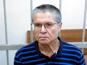 Former Russian Economic Development Minister Alexei Ulyukayev waits for a hearing in a court in Moscow, Russia, Wednesday, Aug. 16, 2017. Alexei Ulyukayev was detained last year after he allegedly accepted $2 million in cash from state oil company Rosneft in a sting set up by the FSB intelligence agency. Ulyukayev was largely seen as a victim of a Kremlin power play against Igor Sechin, chief executive of the oil company Rosneft and President Vladimir Putin&#039;s close ally. (AP Photo/Pavel Golovkin