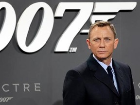 FILE - This is a Wednesday, Oct. 28, 2015 file photo of actor Daniel Craig poses for the media as he arrives for the German premiere of the James Bond movie &#039;Spectre&#039; in Berlin, Germany. British actor Daniel Craig announced he returning to cars, cocktails and camera pens to play James Bond in the franchise‚Äôs next film, due out in 2019. The 49-year old actor told Stephen Colbert on Tuesday night‚Äôs ‚ÄúLate Show‚Äù that it will likely be his last time playing 007, and that he hopes to ‚Äúgo out