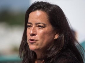 Justice Minister Jody Wilson-Raybould introduces Agriculture Minister Lawrence MacAulay during a news conference in Vancouver, B.C., on Tuesday August 15, 2017. THE CANADIAN PRESS/Darryl Dyck