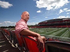 Former CFL player Ken Evraire poses for a photo at TD Place in Ottawa on Wednesday, Aug. 16, 2017. Ken Evraire will donate his brain to science but the former CFL receiver is fearful about what doctors might find. &ampquot;They could say, &#039;We examined his brain and found nothing,&ampquot; the 52-year-old Toronto native said with a chuckle. &ampquot;Many coaches would then say, &#039;I could&#039;ve told you that, I could&#039;ve saved you a lot of time and energy.&#039;&ampquot; But the issue of chronic traumatic encephalopathy (CTE) -- a degener