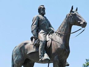 FILE - This Wednesday, June 28, 2017 file photo shows the statue of Confederate Gen. Stonewall Jackson on Monument Avenue in Richmond, Va. Two men who identify themselves as the great-great-grandsons of Stonewall Jackson are calling for the removal of the statue of the Confederate general in Virginia‚Äôs capital city. Jack and Warren Christian say in a letter published by Slate late Wednesday, Aug. 16, 2017, that the removal of the Jackson statue and other Confederate monuments on Richmond‚Äôs f