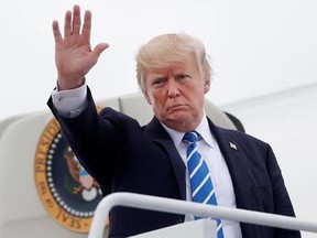 President Donald Trump waves as he boards Air Force One at Hagerstown Regional Airport in Hagerstown, Md., Friday, Aug. 18, 2017. The U.S. appears to be signalling that President Donald Trump&#039;s vow to aggressively promote a &ampquot;buy American, hire American&ampquot; agenda is not open to discussion during negotiations on a new North American Free Trade Agreement. THE CANADIAN PRESS/AP-Pablo Martinez Monsivais